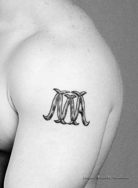 left arm tat